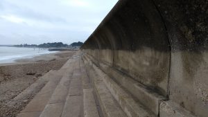 The Wave Wall on HighCliffe Beach. Looking West towards Friars Cliff Beach